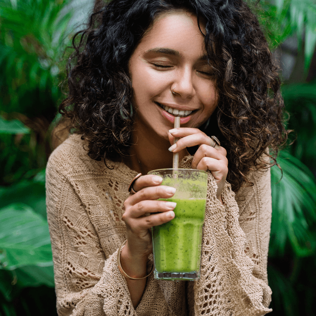 Girl with green smoothie