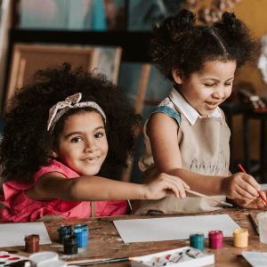 Little girls with curly hair, art class