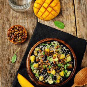 Mango Quinoa Lime Salad - quinoa, black beans, and bell peppers; topped with avocado. 