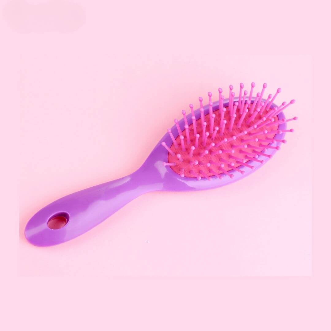 Hair brush to detangle or brush styling curly hair.