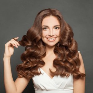 Girl with long curly hair. 