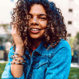 Young woman with curly hair.