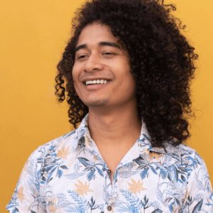 Guy with long curly hair. 