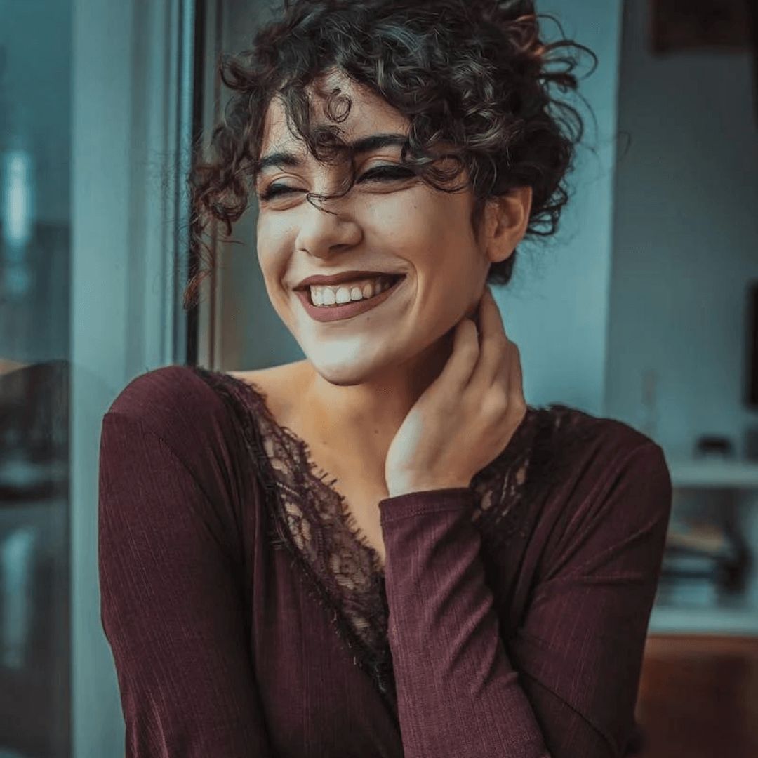 https://plabcurlove.com/how-to-get-bangs-for-curly-hair/